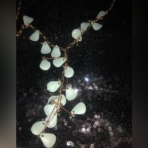 Sea-foam green necklace on hold chain